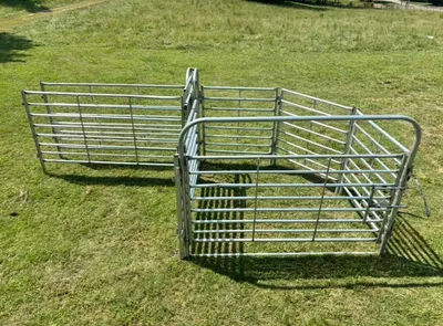 Blevins cattle handling system: 90-degree sweep tub and 10-foot alley with slide gate