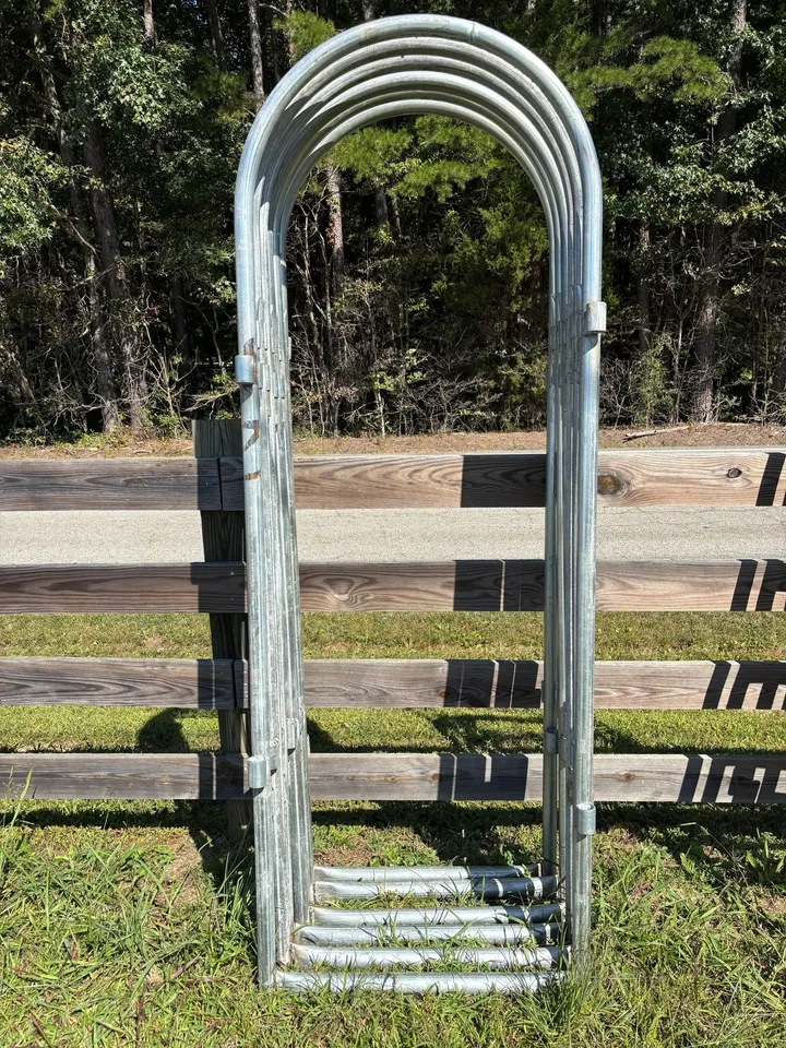 Galvanized arched alley frame standing upright