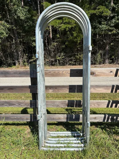 Galvanized arched alley frame standing upright