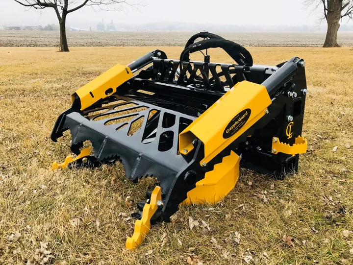 EZ Puller Grapple/Guard Combo resting in a dry field