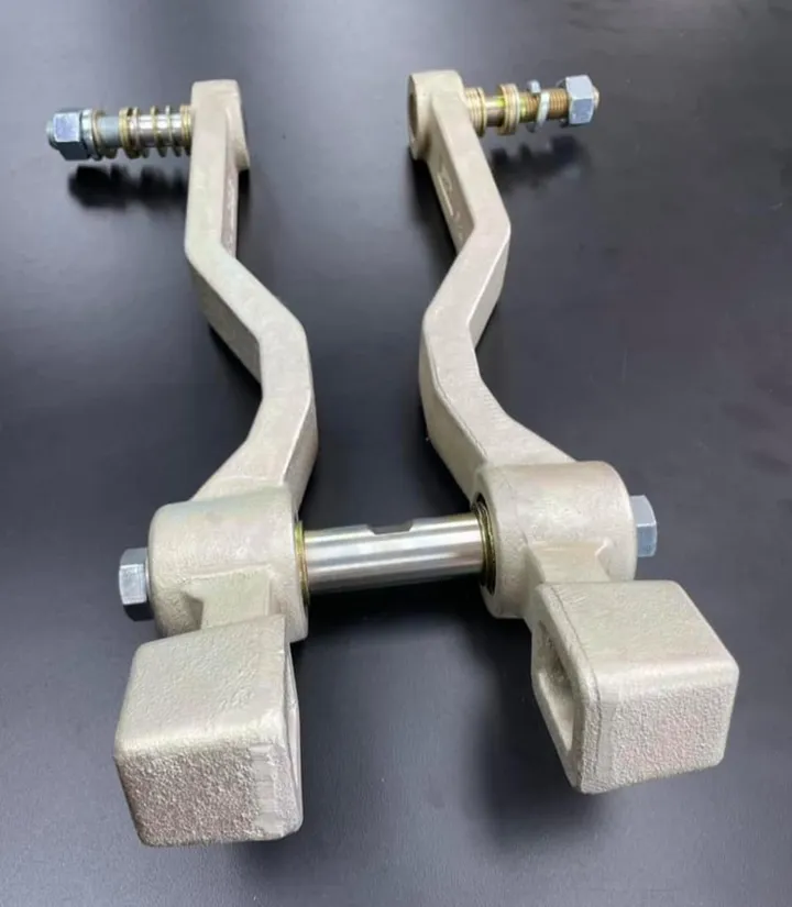 Norseman gauge wheel arm kit for Kinze planters: pair of cast arms with mounting bolts