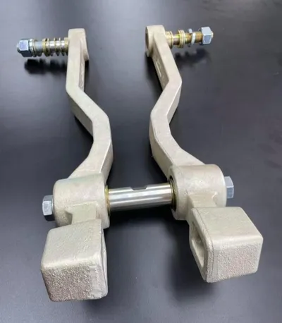 Norseman gauge wheel arm kit for Kinze planters: pair of cast arms with mounting bolts