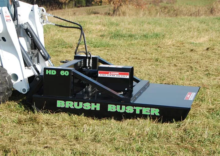 HD 60 Brush Buster on a skid steer cutting grass