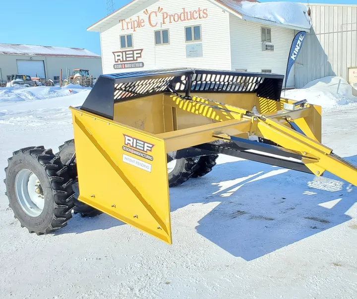Reif V-Shape Box Scraper parked in snow